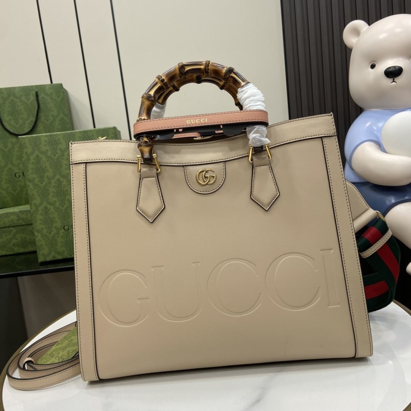 G*u*i shopping bags